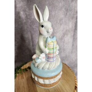 Easter Bunny Rabbit Sitting on Macaron Cookie Holding Pastel Macarons Figurine